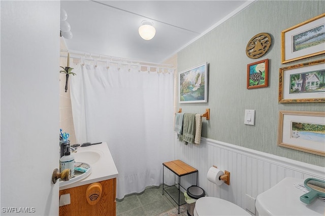 6253 Valeria Rd, Bokeelia, FL 33922 - bathroom featuring tile patterned flooring, vanity, toilet, and crown molding