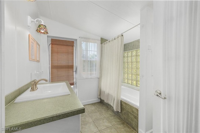 6253 Valeria Rd, Bokeelia, FL 33922 - bathroom with tile patterned flooring, vanity, shower / tub combo with curtain, and lofted ceiling