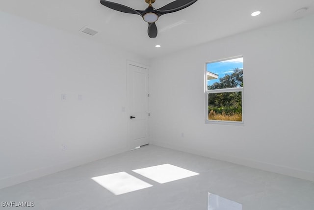 spare room with ceiling fan