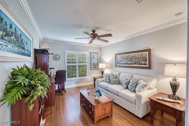 living room featuring ceiling fan, ornamental molding, and hardwood / wood-style flooring