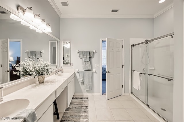 bathroom with walk in shower, crown molding, and tile patterned flooring