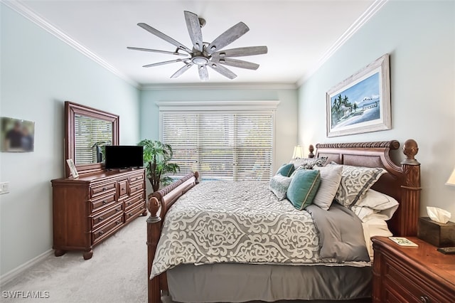 bedroom with ceiling fan, crown molding, and light colored carpet