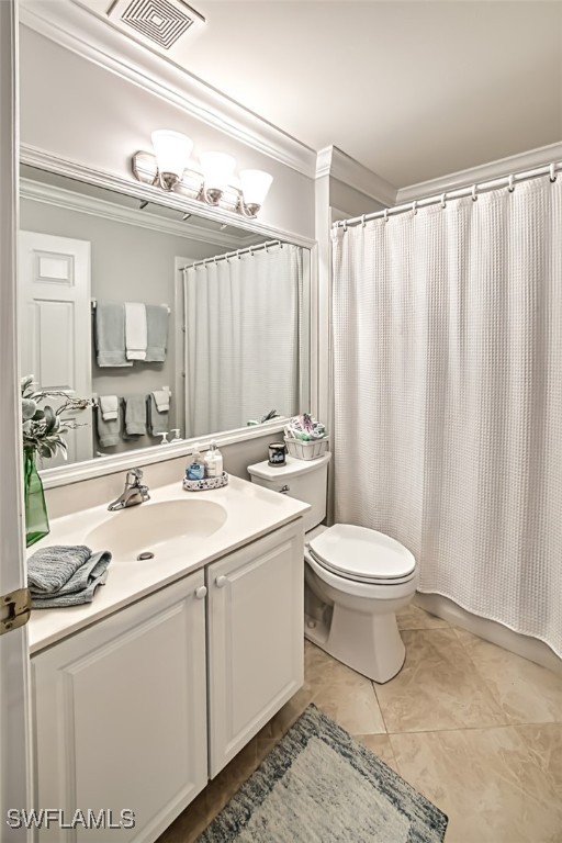 bathroom with curtained shower, tile patterned flooring, vanity, toilet, and crown molding