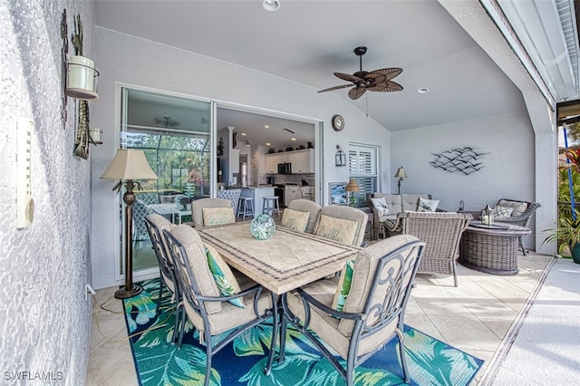 view of patio / terrace featuring ceiling fan and an outdoor kitchen