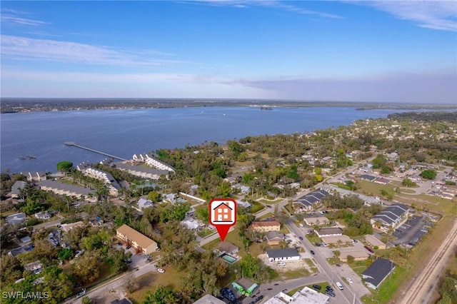 drone / aerial view with a water view