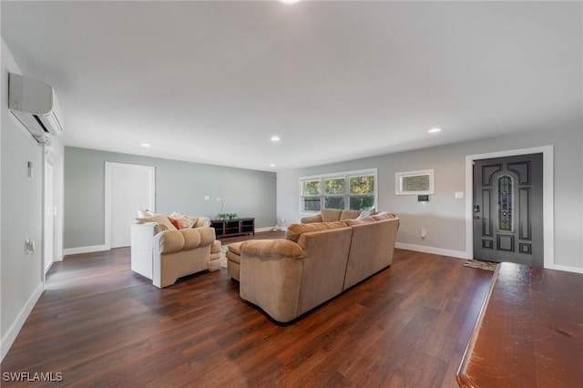 living room with a wall unit AC and dark hardwood / wood-style flooring