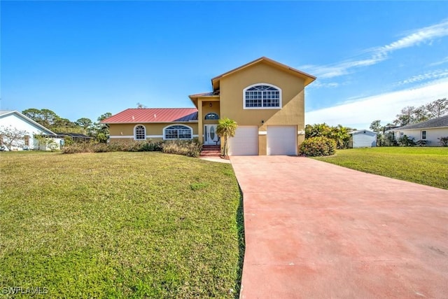 view of front facade featuring a garage and a front yard