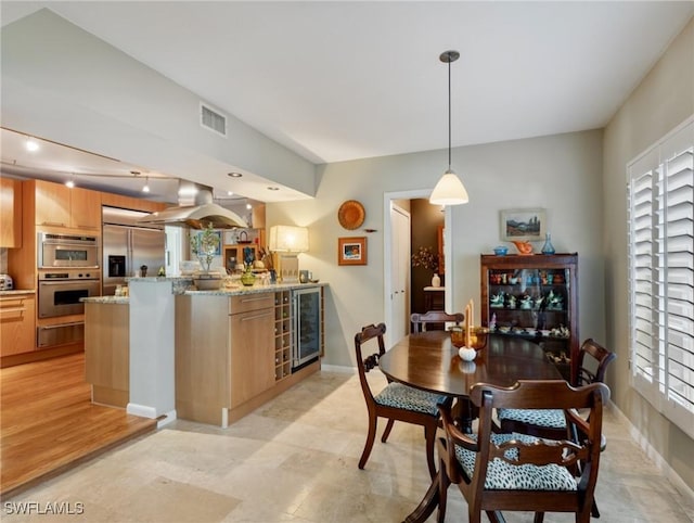 dining room with wine cooler