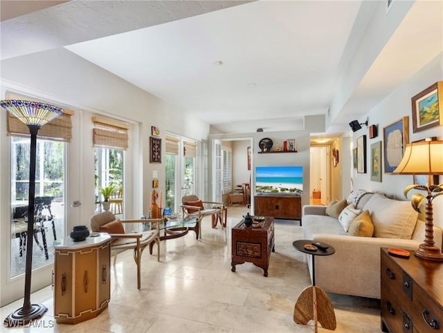 living room featuring french doors and a wealth of natural light