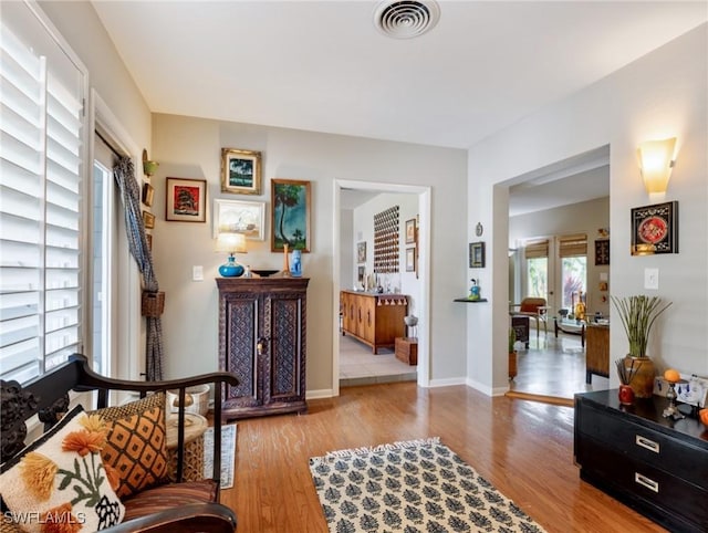 living area featuring light hardwood / wood-style floors