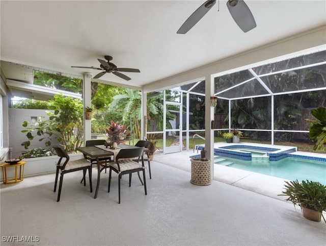 view of pool featuring ceiling fan, a lanai, a patio, and an in ground hot tub