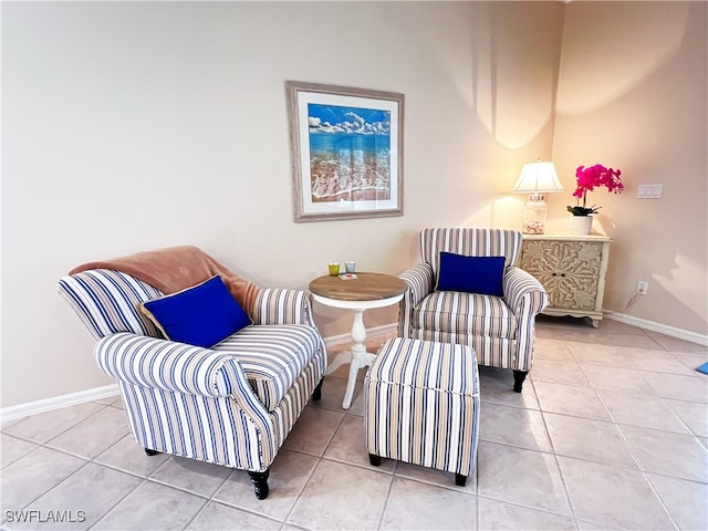 sitting room featuring light tile patterned floors