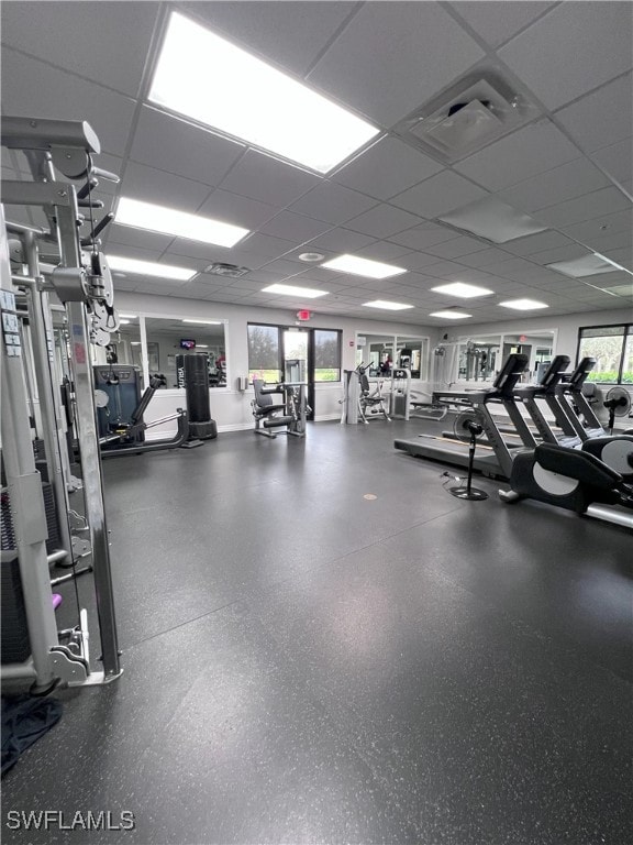 workout area with a drop ceiling