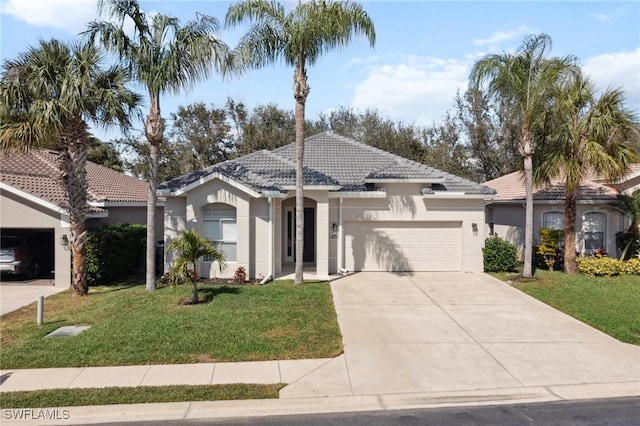 view of front facade with a garage and a front yard