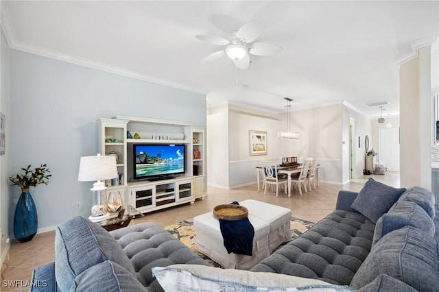 tiled living room with ornamental molding and ceiling fan