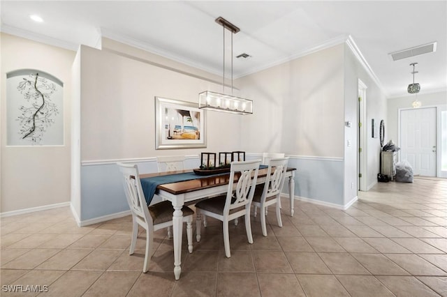 tiled dining area with ornamental molding