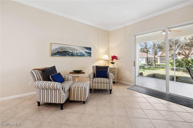 sitting room featuring ornamental molding and light tile patterned floors