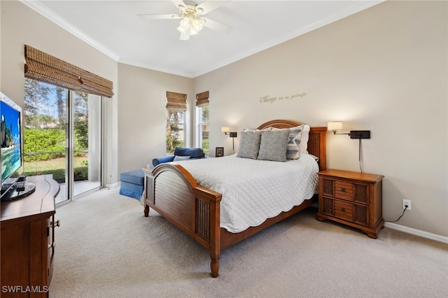 carpeted bedroom with multiple windows, ornamental molding, access to exterior, and ceiling fan