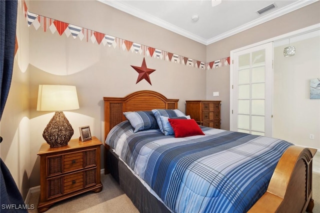 carpeted bedroom with crown molding