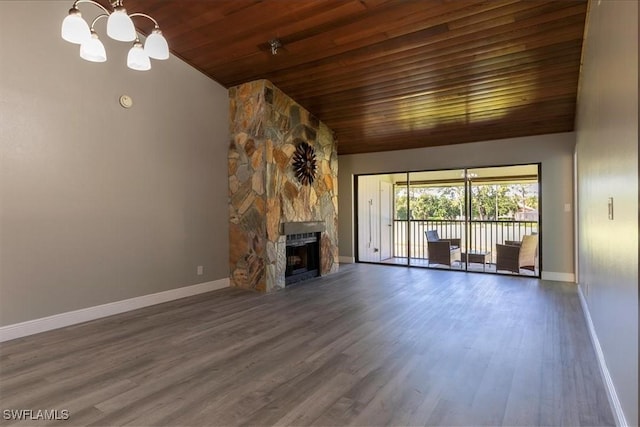 unfurnished living room with a fireplace, wood ceiling, high vaulted ceiling, dark hardwood / wood-style flooring, and a chandelier