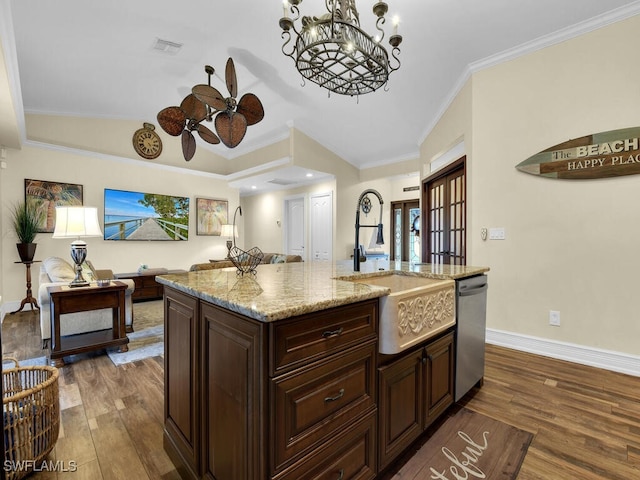 kitchen featuring sink, a center island with sink, stainless steel dishwasher, and ornamental molding