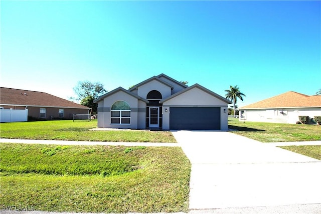 ranch-style house with a front lawn and a garage