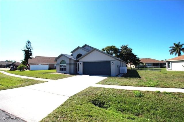 single story home with a front lawn and a garage