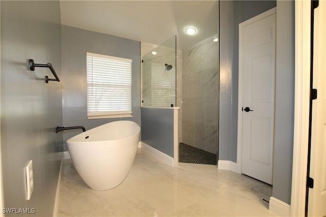 bathroom with independent shower and bath