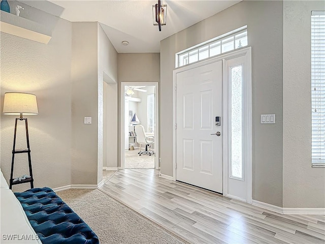 entrance foyer with light hardwood / wood-style floors