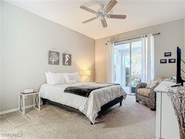 carpeted bedroom featuring access to outside and ceiling fan