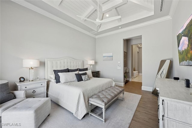 bedroom with coffered ceiling, hardwood / wood-style flooring, ornamental molding, ceiling fan, and beamed ceiling