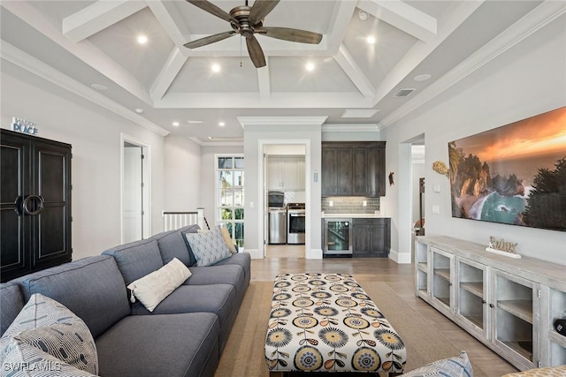 living room with ceiling fan, wine cooler, light hardwood / wood-style flooring, and coffered ceiling