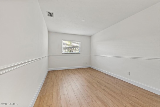 empty room featuring light hardwood / wood-style flooring