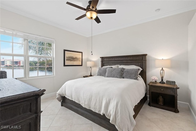 tiled bedroom featuring ceiling fan, crown molding, and a water view