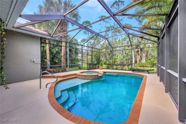 view of swimming pool with a lanai, an in ground hot tub, and a patio