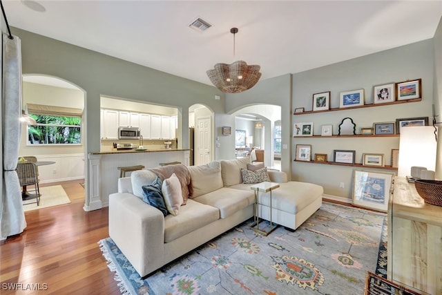 living room featuring light wood-type flooring