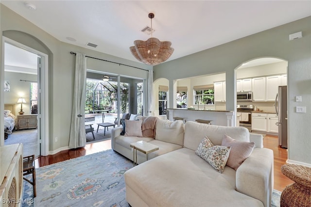 living room with light hardwood / wood-style flooring