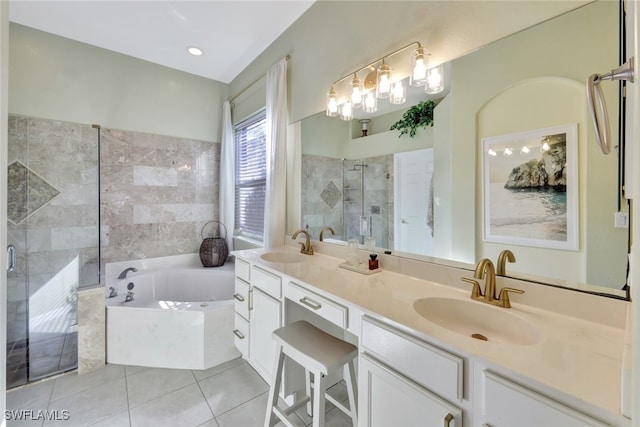 bathroom featuring separate shower and tub, tile patterned flooring, and vanity