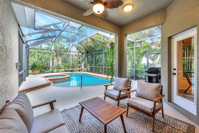 view of swimming pool featuring an in ground hot tub, a lanai, an outdoor living space, ceiling fan, and a patio