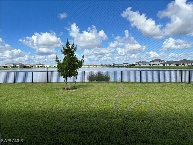 view of yard with a water view