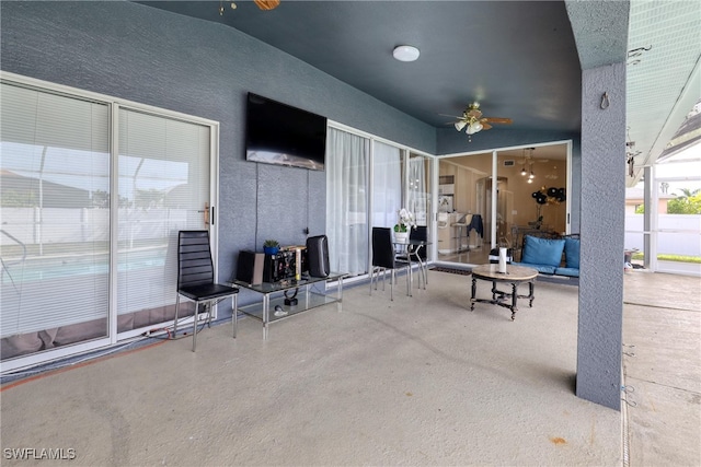 view of patio / terrace featuring ceiling fan