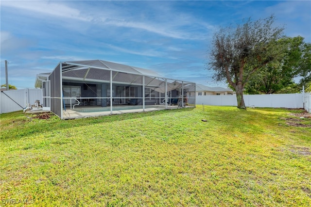 view of yard featuring a pool and a patio