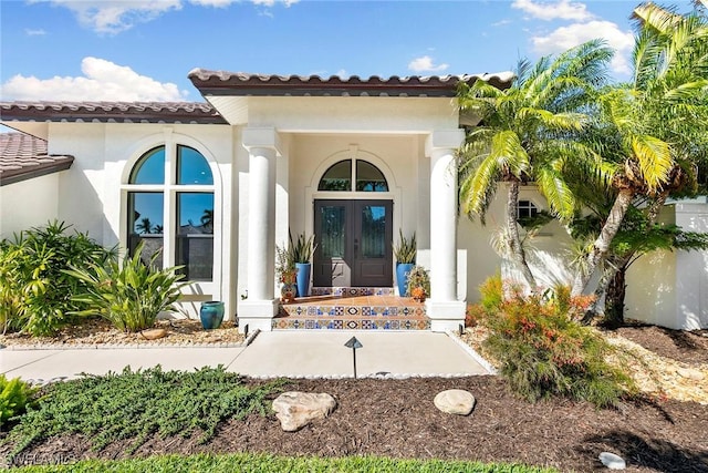 property entrance featuring covered porch