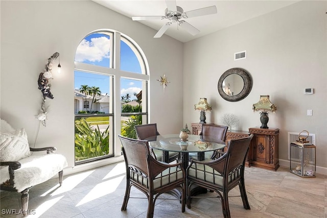 dining area with ceiling fan