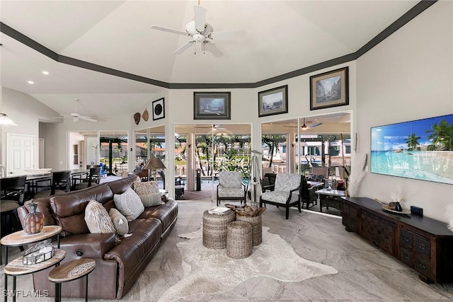 living room with lofted ceiling, a wealth of natural light, and french doors