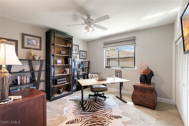 office space with ceiling fan