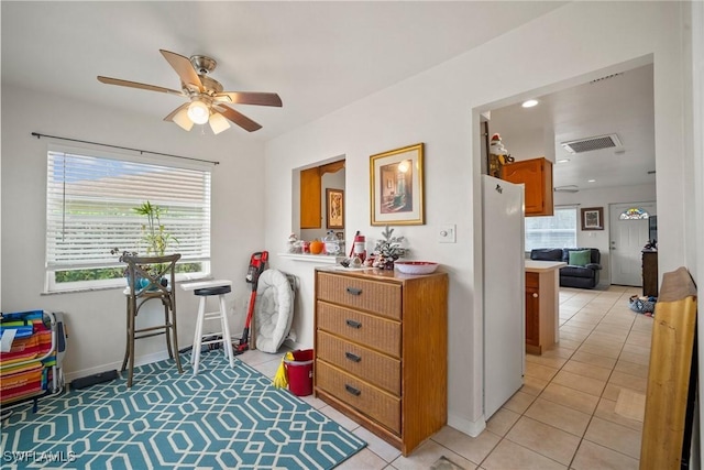 interior space featuring light tile patterned flooring