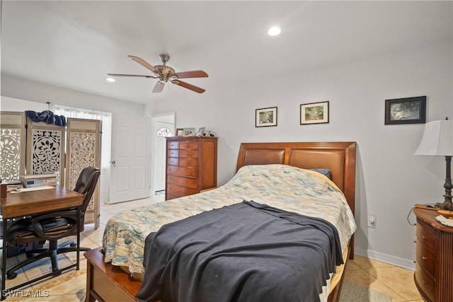 bedroom with ceiling fan and light tile patterned flooring