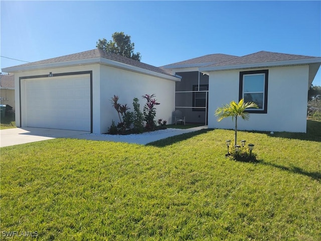 ranch-style home with a garage and a front yard