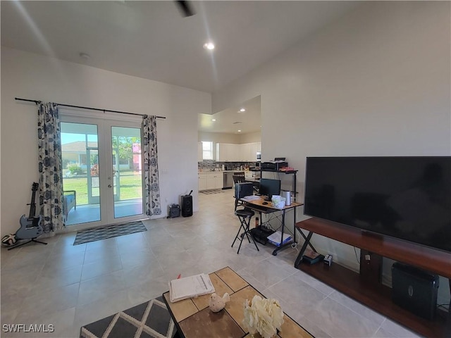 tiled living room featuring french doors